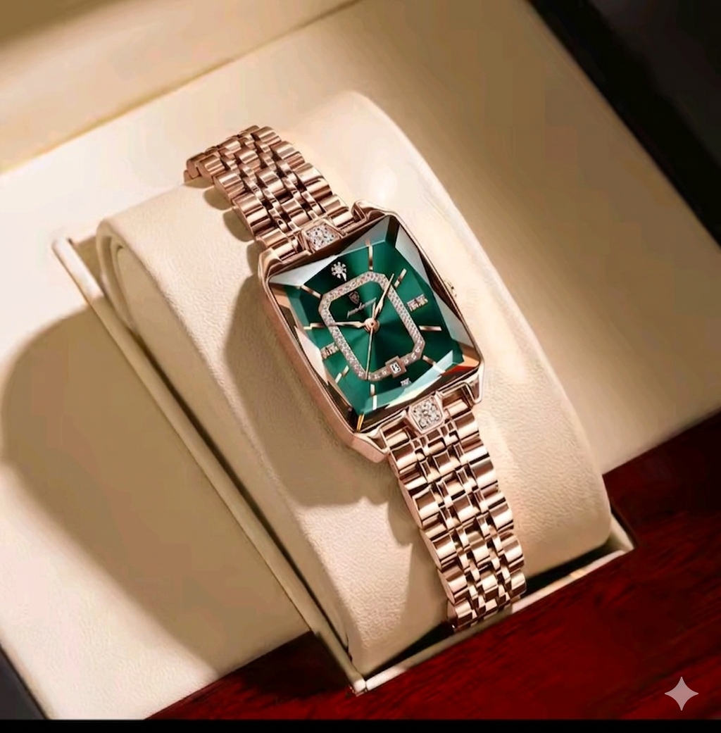 Luxury watch with rose gold strap and green face on a white cushion